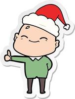 cartone animato adesivo felice di un uomo calvo che indossa il cappello di Babbo Natale vettore