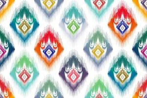 disegno etnico senza cuciture ikat. tappeto in tessuto azteco ornamenti mandala decorazioni tessili carta da parati. tribale boho nativo etnico turchia ricamo tradizionale sfondo vettoriale