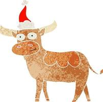 cartone animato retrò di un toro che indossa il cappello di Babbo Natale vettore