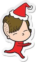 adesivo cartone animato di una ragazza in tutina che indossa il cappello di Babbo Natale vettore
