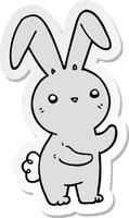 adesivo di un simpatico coniglio cartone animato vettore