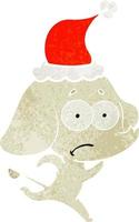 cartone animato retrò di un elefante incerto scappando indossando il cappello di Babbo Natale vettore