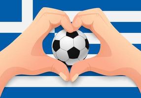 grecia pallone da calcio e mano a forma di cuore vettore