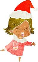 felice retrò cartone animato di una ragazza che indossa il cappello di Babbo Natale vettore