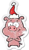 felice cartone animato adesivo angosciato di un maiale che indossa il cappello di Babbo Natale vettore