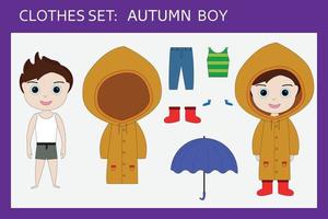 un set di vestiti per un ragazzino allegro per l'autunno vettore