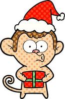 illustrazione in stile fumetto di una scimmia di Natale che indossa il cappello di Babbo Natale vettore