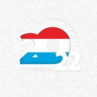 felice anno nuovo 2022 per il lussemburgo sullo sfondo del fiocco di neve. vettore