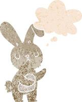 simpatico cartone animato coniglio e bolla di pensiero in stile retrò strutturato vettore