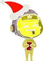 cartone animato retrò di un astronauta che ride che indossa il cappello di Babbo Natale vettore