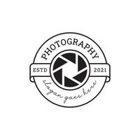 distintivo classico studio fotografico con lente icona simbolo per la fotografia timbro logo modello vettore