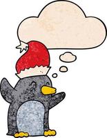 simpatico cartone animato pinguino di Natale e bolla di pensiero in stile grunge texture pattern vettore