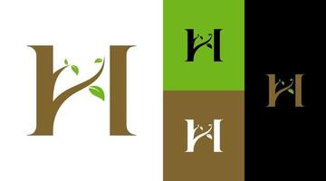 h lettera monogramma foglie verdi con albero ambiente naturale logo design concept vettore
