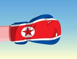 bandiera della Corea del Nord sul guantone da boxe. confronto tra paesi con potere competitivo. atteggiamento offensivo. separazione dei poteri. design pronto per il modello. vettore