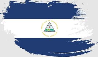 bandiera del nicaragua con texture grunge vettore