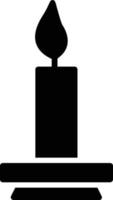 icona del glifo con candela vettore