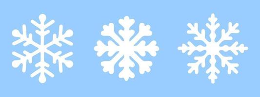 fiocchi di neve bianchi su sfondo blu. elementi isolati in uno stile piatto. set elegante per il tuo capodanno o design natalizio. illustrazione vettoriale. vettore