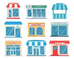 icone degli edifici dei negozi della città. illustrazione di catoon vettoriale. vettore
