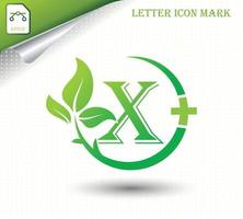 lettera x con modello vettoriale foglia verde