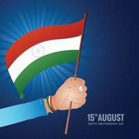 mano che tiene la bandiera indiana con sfondo felice giorno dell'indipendenza vettore