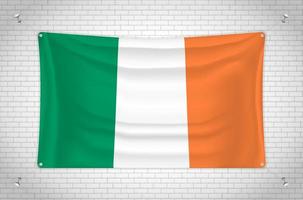 bandiera dell'Irlanda appesa al muro di mattoni. disegno 3d. bandiera attaccata al muro. disegnando ordinatamente in gruppi su livelli separati per una facile modifica. vettore