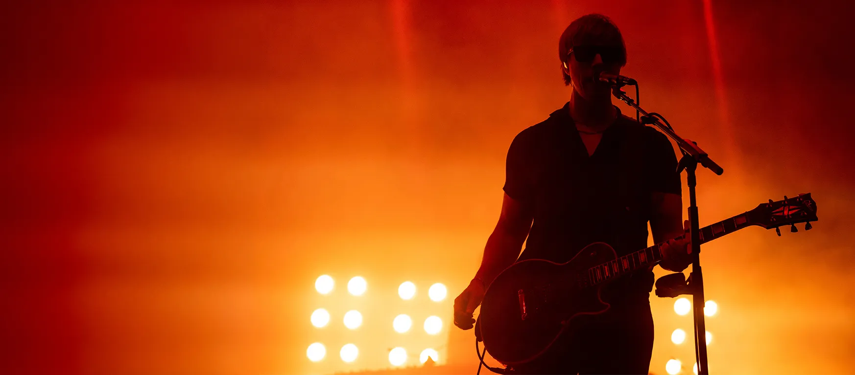 Rock star playing a guitar and singing